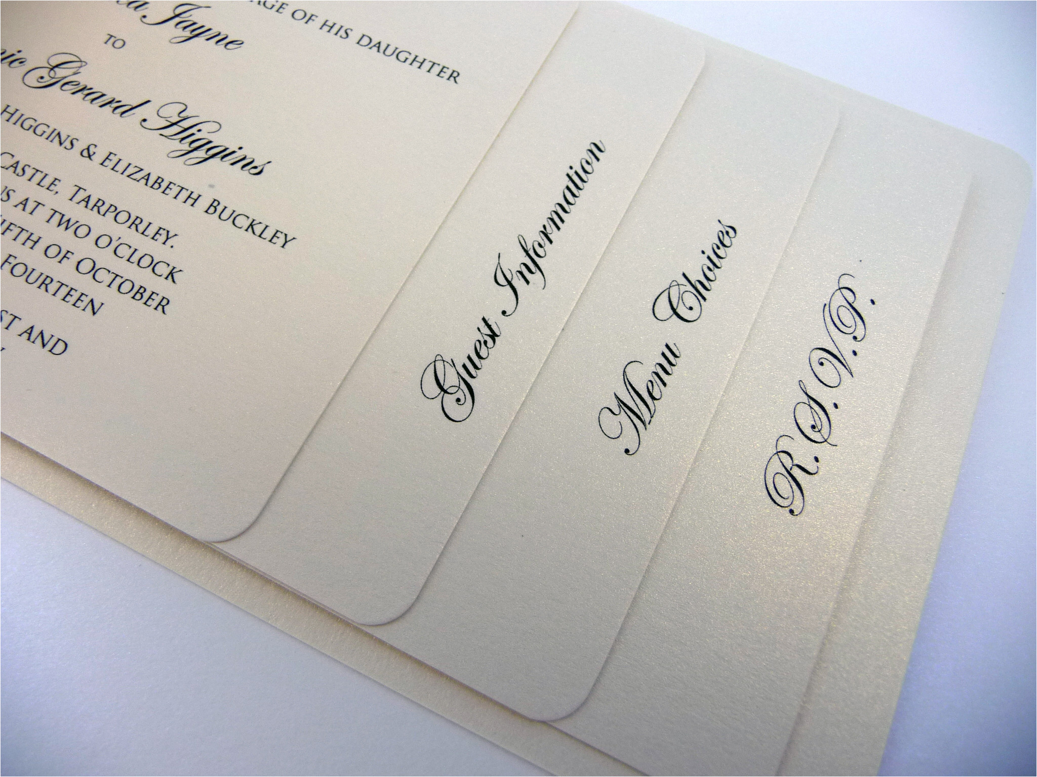 cheque book wedding invitation with a peach and ivory colour scheme