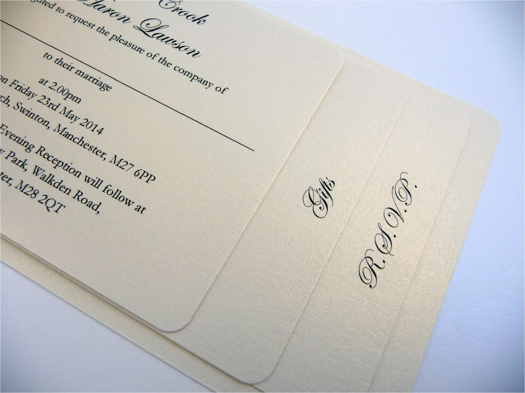 ivory cheque book wedding invitation with a heart shape diamante ribbon buckle