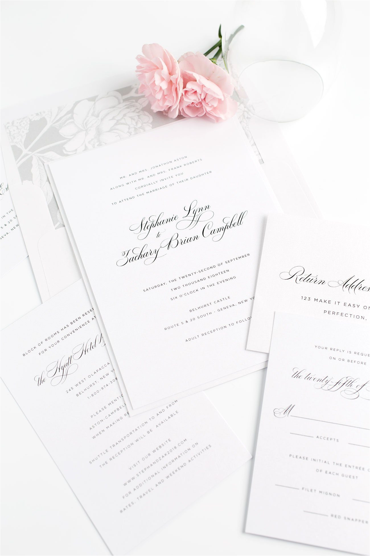 delicate wedding invitations in silver